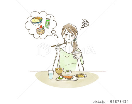 物足りない食事をしている女性 92873434