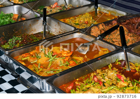 Rice and curry, the staple daily Thai food of workers, usually sold in cookshops called street food dishes. Rice and curry, the staple daily Thai food of workers, usually sold in cookshops called street food dishes. 92873716
