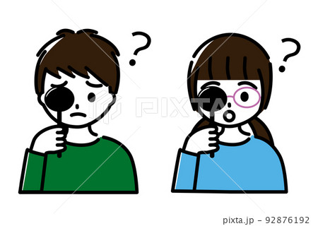 幼児から小学生低学年くらいの男の子と女の子が視力検査を受けていて、よく見えていない（上半身） 92876192