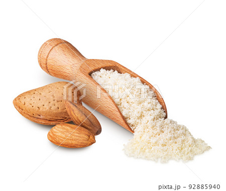 Wooden scoop full of almond flour isolated on white Wooden scoop full of almond flour isolated on white 92885940