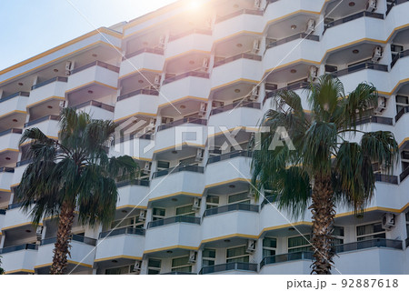 Identical semicircular balconies on the facade of a building in southern Turkey. 92887618