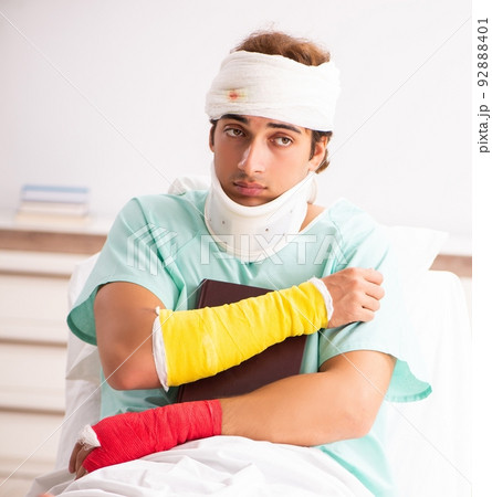 Young injured man staying in the hospital Young injured man staying in the hospital 92888401