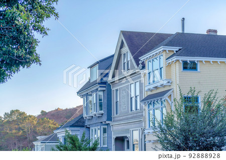 Neighborhood in San Francisco, CA with row of houses Neighborhood in San Francisco, CA with row of houses 92888928