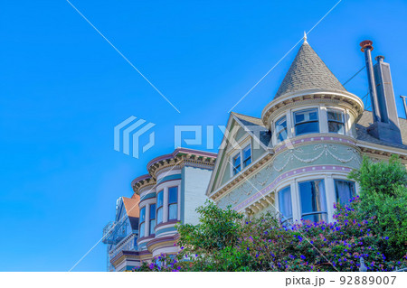 San Francisco victorian houses in a low angle view against the sky San Francisco victorian houses in a low angle view against the sky 92889007