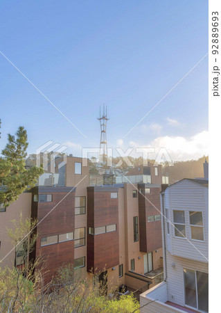 View of townhouses against the Sutro Tower at the back in San Francisco, CA 92889693
