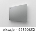 Blank A4 brushed metal plate. Office corporate Signage plate Mock Up template for branding, logo. Faceted metal advertising signboard mockup side view. 3D rendering 92890852