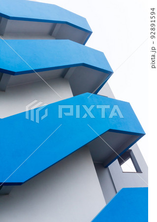 Gray - blue architectural building bottom view Gray - blue architectural building bottom view 92891594