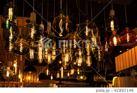 LED modern lights and bulbs on display in store lighting department. 92892146