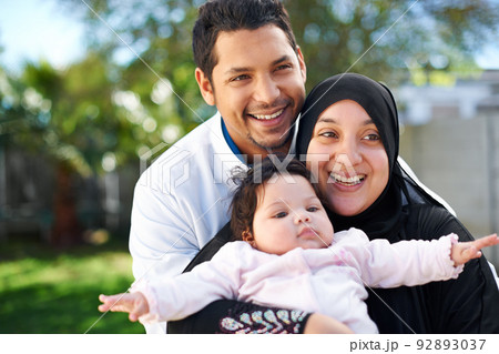 Were a blessed family. Portrait of a muslim family enjoying a day outside. Were a blessed family. Portrait of a muslim family enjoying a day outside. 92893037
