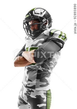 Sport close up. Young american football player crossed his arms. Sports emotions. American football Sport close up. Young american football player crossed his arms. Sports emotions. American football 92893890