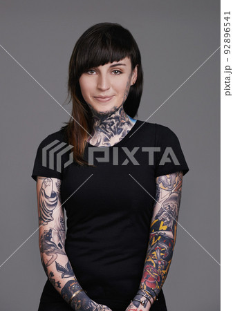 Let your beauty rise to the surface. A cropped studio portrait of a beautiful tattooed young woman. 92896541