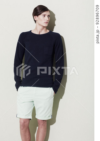 Elegant male features. A handsome young man with elegant facial features posing for a studio shoot. 92896709