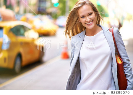 Out and about. A gorgeous young woman with her handbag in New York. 92899070