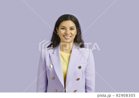 Portrait of attractive straight-haired brunette girl leader top director wearing purple blazer isolated over violet purple color background Portrait of attractive straight-haired brunette girl leader top director wearing purple blazer isolated over violet purple color background 92908305
