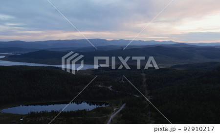 Dramatic sky and lakes in valley of Altai in evening time Dramatic sky and lakes in valley of Altai in evening time 92910217
