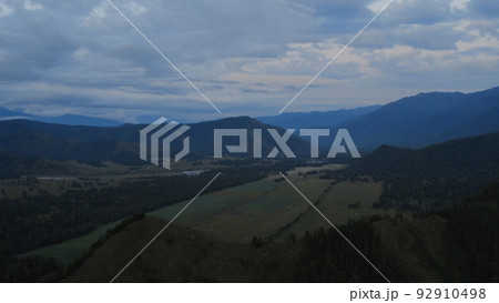 Aerial view from a drone on majestic valley in Altai under sunset sky 92910498