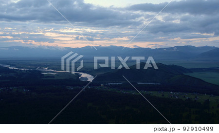 Aerial view from a drone on majestic valley in Altai under sunset sky 92910499