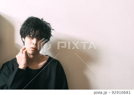 Portrait of young adult asian men with japanese hair style. 92910681