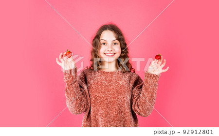 Eat healthy. Summer berries. Child eating strawberry. Happy child. Diet and nutrition. Hungry kid. Girl eating fresh natural strawberry. Healthy food. Health care. Healthy breakfast. Vitamin concept Eat healthy. Summer berries. Child eating strawberry. Happy child. Diet and nutrition. Hungry kid. Girl eating fresh natural strawberry. Healthy food. Health care. Healthy breakfast. Vitamin concept 92912801