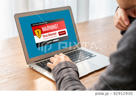 Virus warning alert on computer screen detected modish cyber threat 92912930