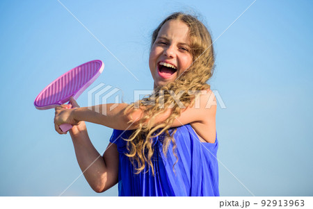 Full of energy. healthy lifestyle. small girl with tennis racquet. summer sport activity. energetic child. sport in motion. sporty game playing. summer outdoor games. play tennis. childhood happiness Full of energy. healthy lifestyle. small girl with tennis racquet. summer sport activity. energetic child. sport in motion. sporty game playing. summer outdoor games. play tennis. childhood happiness 92913963