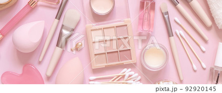Natural skin care products and decorative cosmetics on light pink, top view Natural skin care products and decorative cosmetics on light pink, top view 92920145