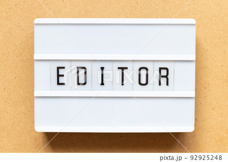 Lightbox with word editor on wood background 92925248