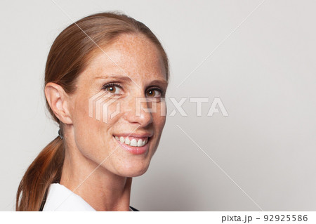 Beautiful gorgeous mid aged mature woman face on white Beautiful gorgeous mid aged mature woman face on white 92925586