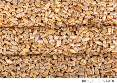 Full frame background and texture of kozinak tile from seeds and molasses. 92926016