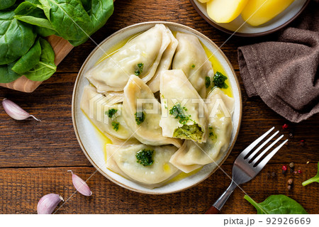 Spinach potato stuffed dumplings or pierogi 92926669