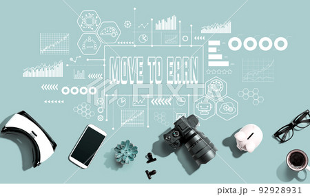 Move to Earn theme with electronic gadgets and office supplies 92928931