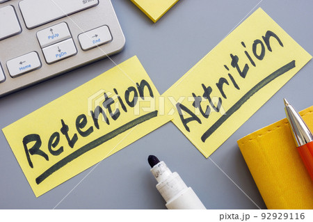 Pieces of papers with words Retention and attrition. Pieces of papers with words Retention and attrition. 92929116