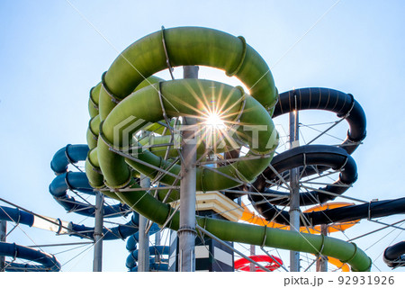 Colorful water slides in aqua park 92931926