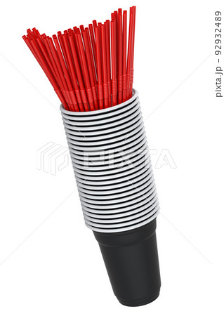 Set of plastic disposable party cups for coffee with heap straw on white 92932489