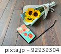 向日葵の花束とiPhone 92939304