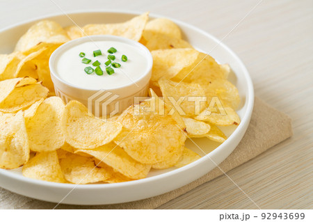 potato chips with sour cream potato chips with sour cream 92943699