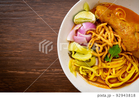 Northern Thai noodle curry soup with chicken Northern Thai noodle curry soup with chicken 92943818