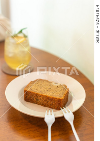 banana cake on plate in cafe restaurant 92943854