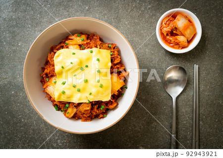 kimchi fried rice with pork and topped cheese 92943921