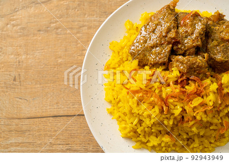 Beef Biryani or Curried rice and beef - Thai-Muslim version of Indian biryani, with fragrant yellow rice and beef 92943949