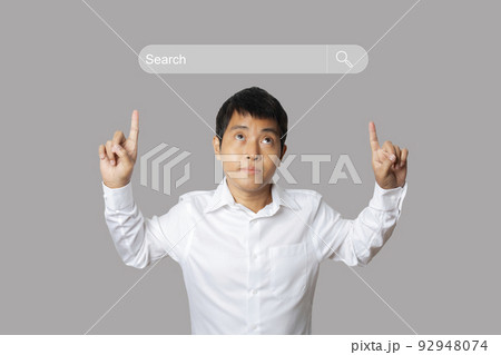 Businessman press search button on virtual screen information data on internet networking. Businessman press search button on virtual screen information data on internet networking. 92948074