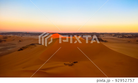 Sunset view to Tin Merzouga dune at Tassili nAjjer national park in Algeria 92952757