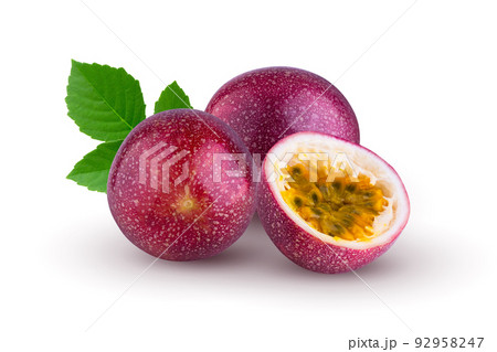 Whole passionfruit and a half of maracuya isolated on white background. 92958247