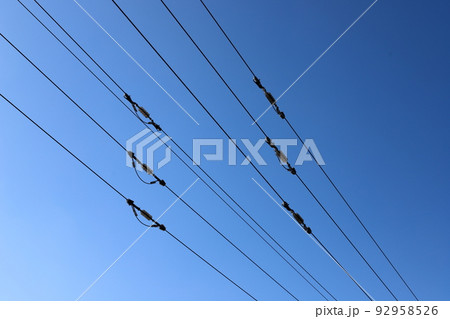 Electrical wires carrying high voltage current. Electrical wires carrying high voltage current. 92958526