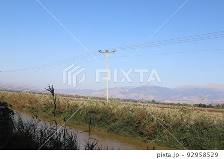 Electrical wires carrying high voltage current. 92958529