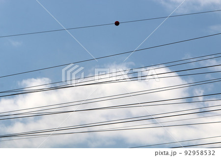 Electrical wires carrying high voltage current. Electrical wires carrying high voltage current. 92958532