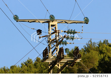Electrical wires carrying high voltage current. Electrical wires carrying high voltage current. 92958743