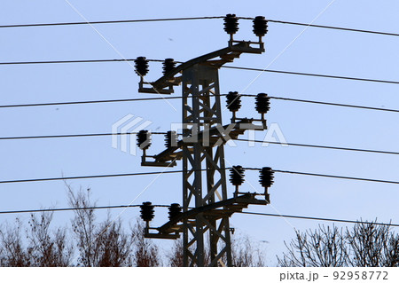 Electrical wires carrying high voltage current. Electrical wires carrying high voltage current. 92958772