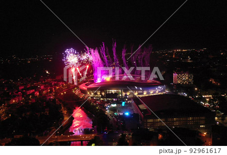 Fireworks above the city, aerial view. Flying during New Year's Eve, 4th of July celebration, music festival 92961617