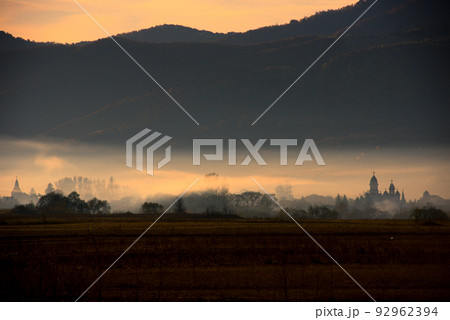 Morning haze over the village Morning haze over the village 92962394